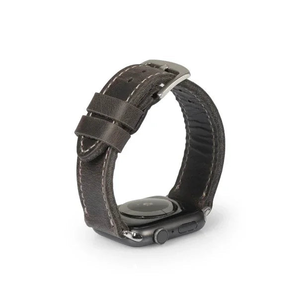 Handcrafted dark brown leather watch band with visible stitching on a smart watch