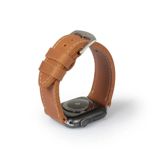 Handcrafted camel brown full-grain leather Apple Watch strap by Yukon Bags on white background